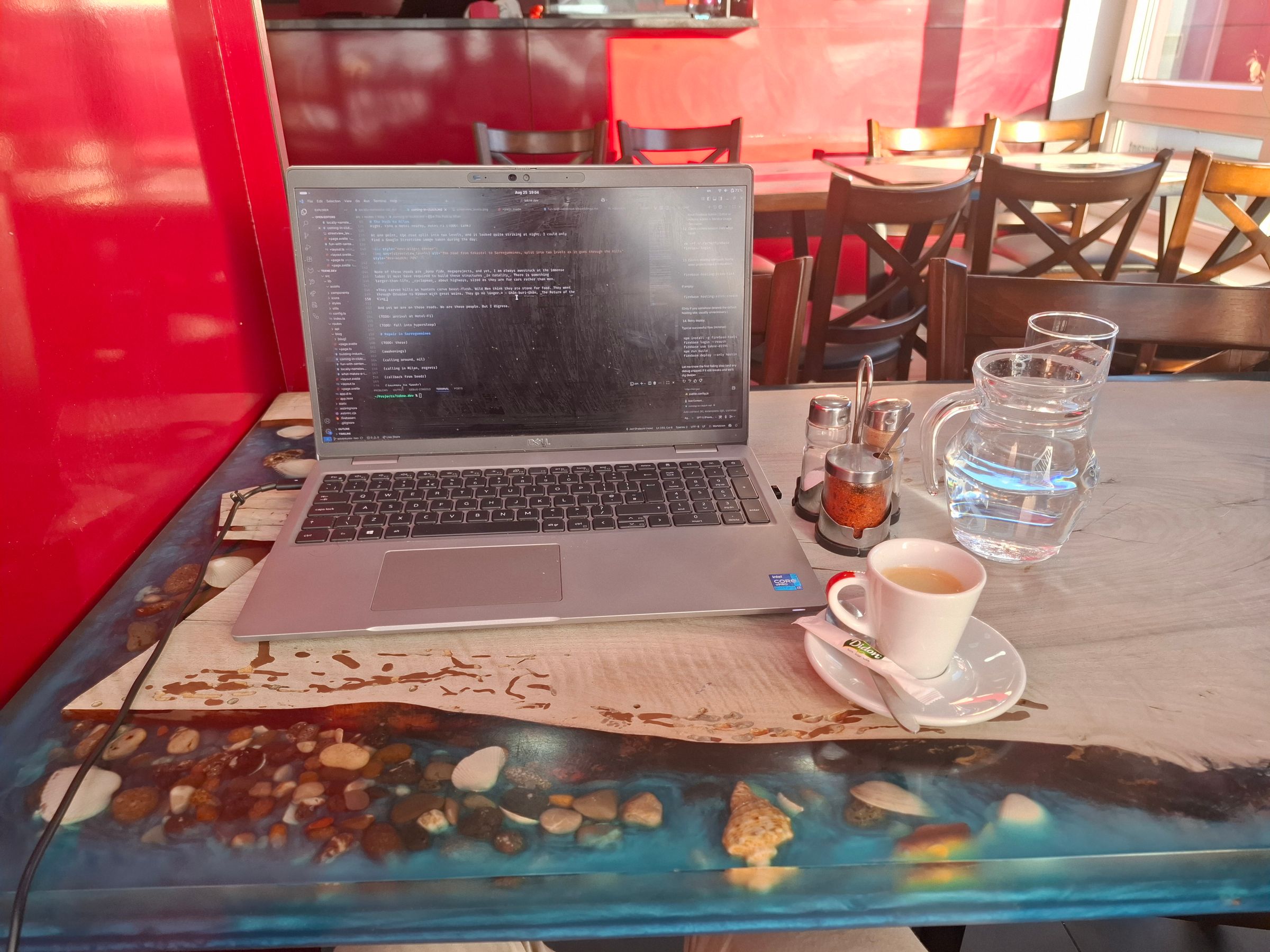 Table at Kebab Le Bosphore, with espresso and a carafe of water