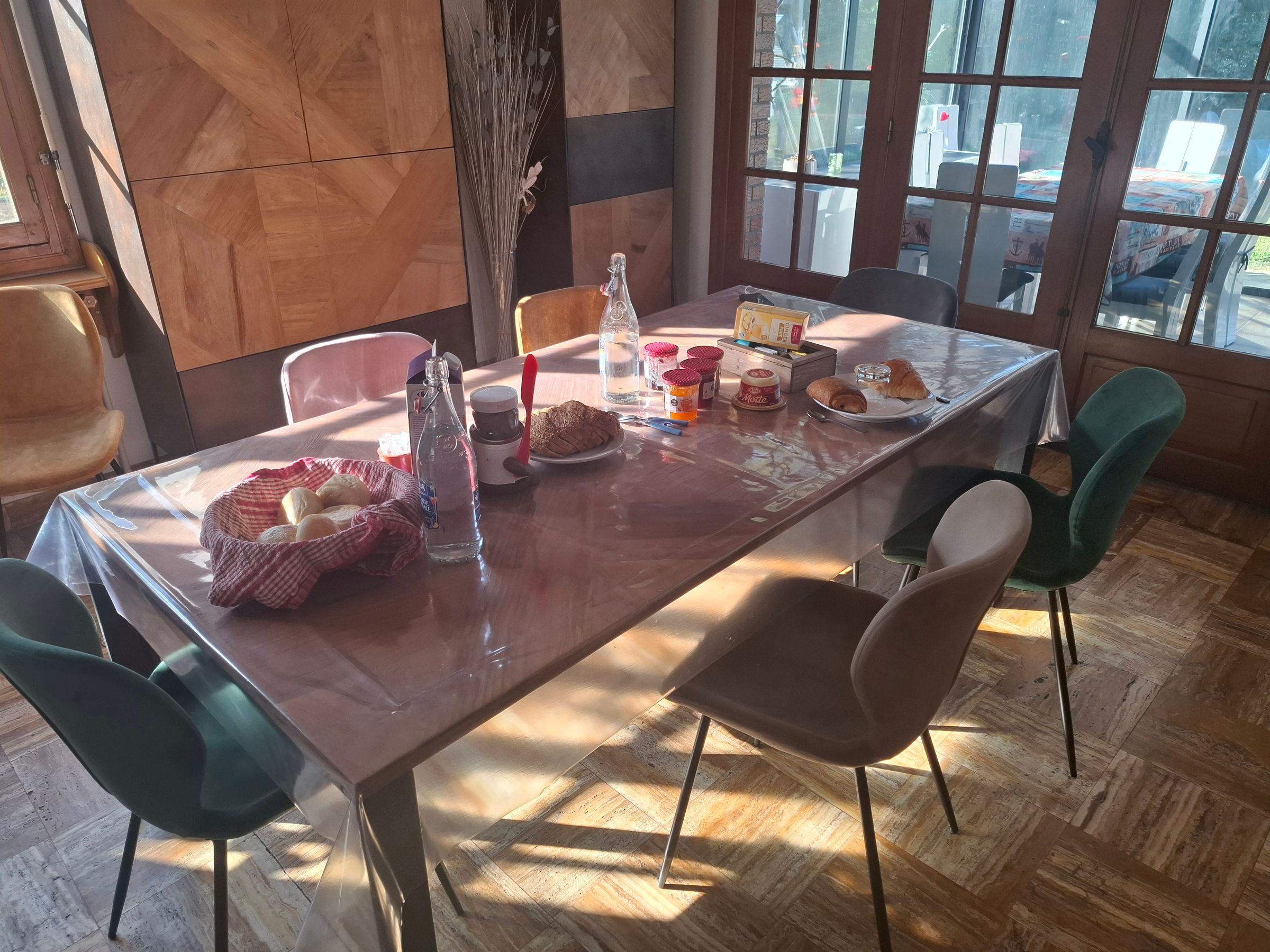 Some croissants, bread, and jams for breakfast at L'Emanuella