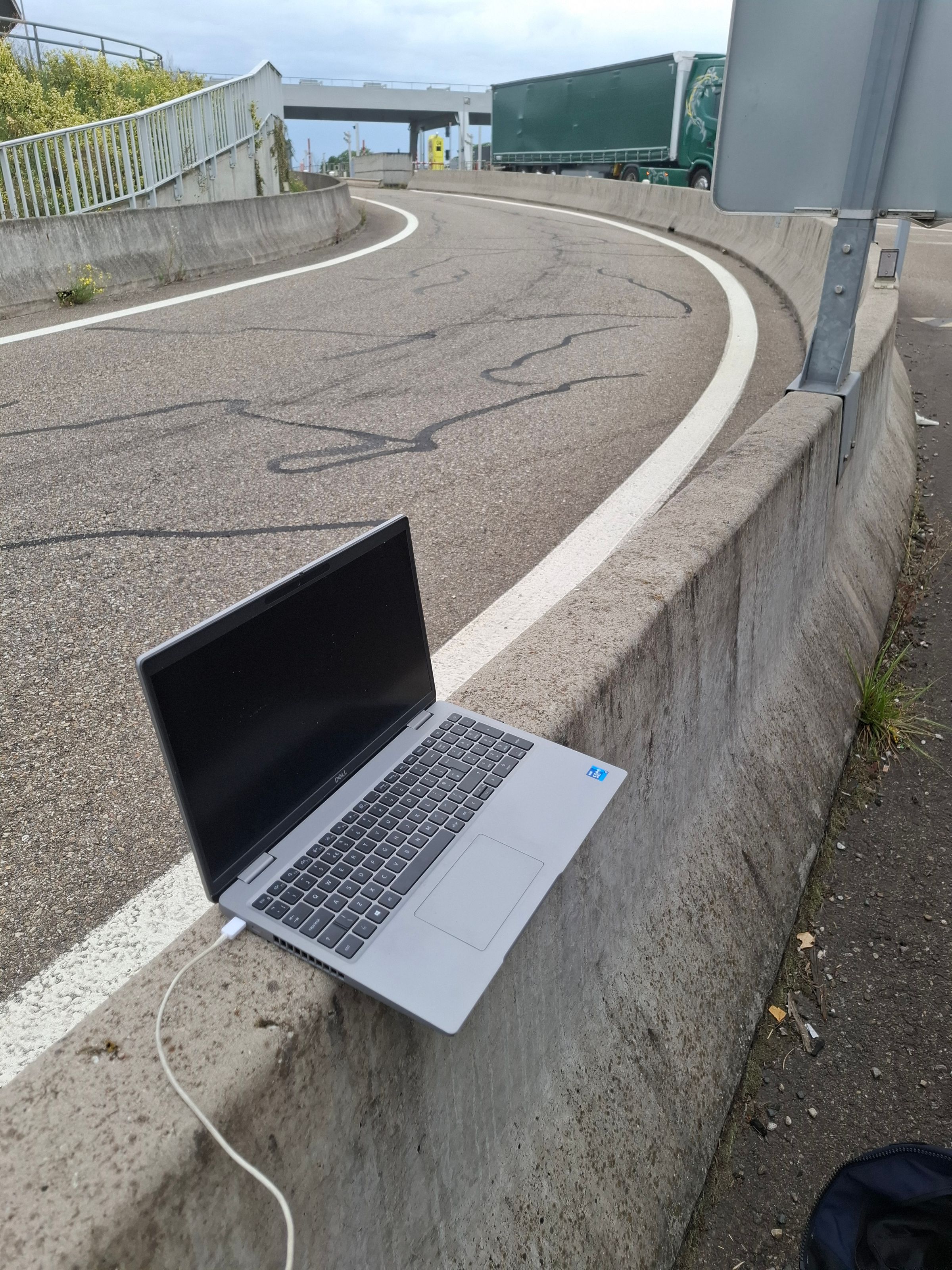 My laptop left on the side of the highway.